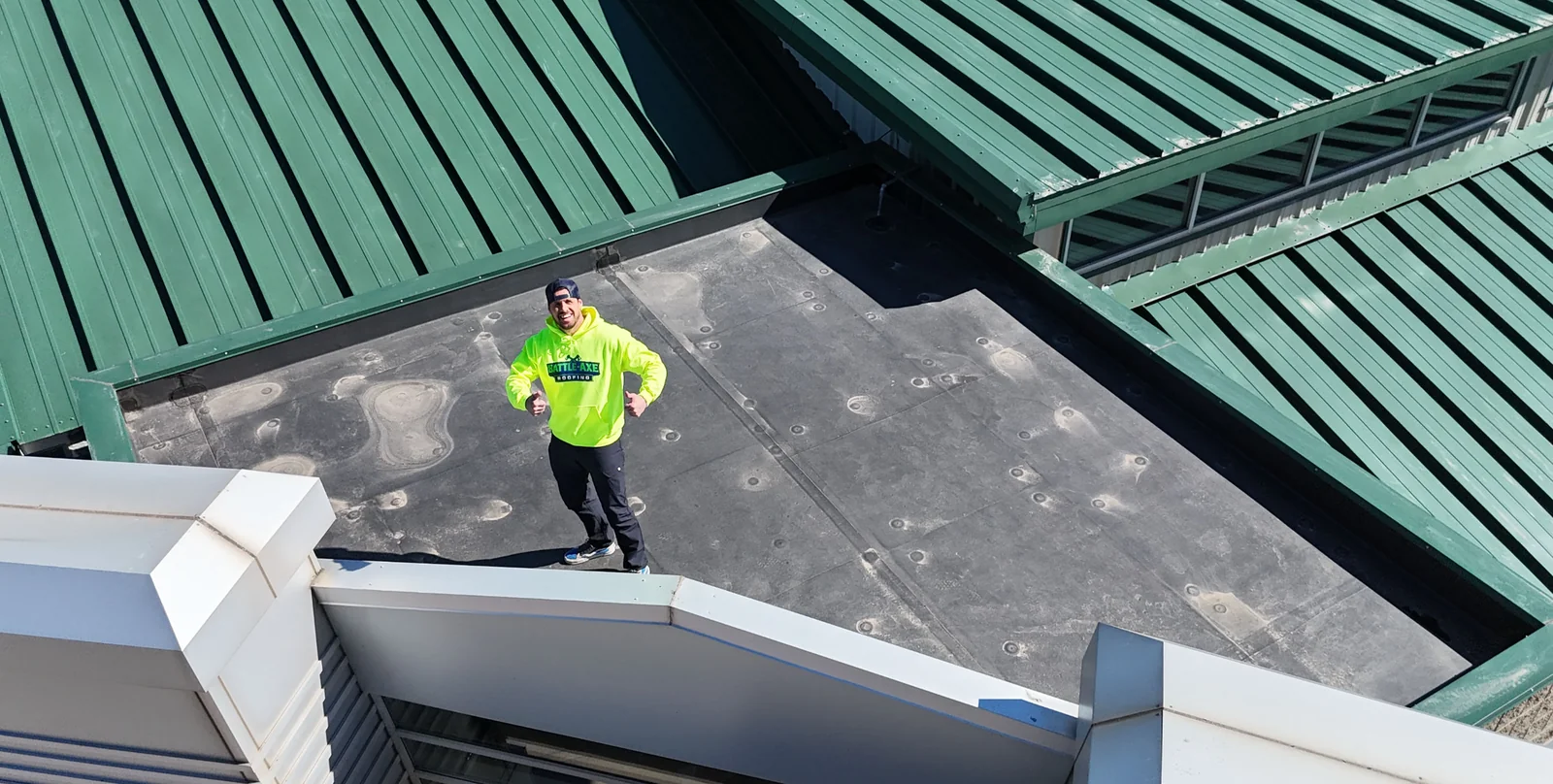 Battle-Axe Roofing crew on a commercial roof