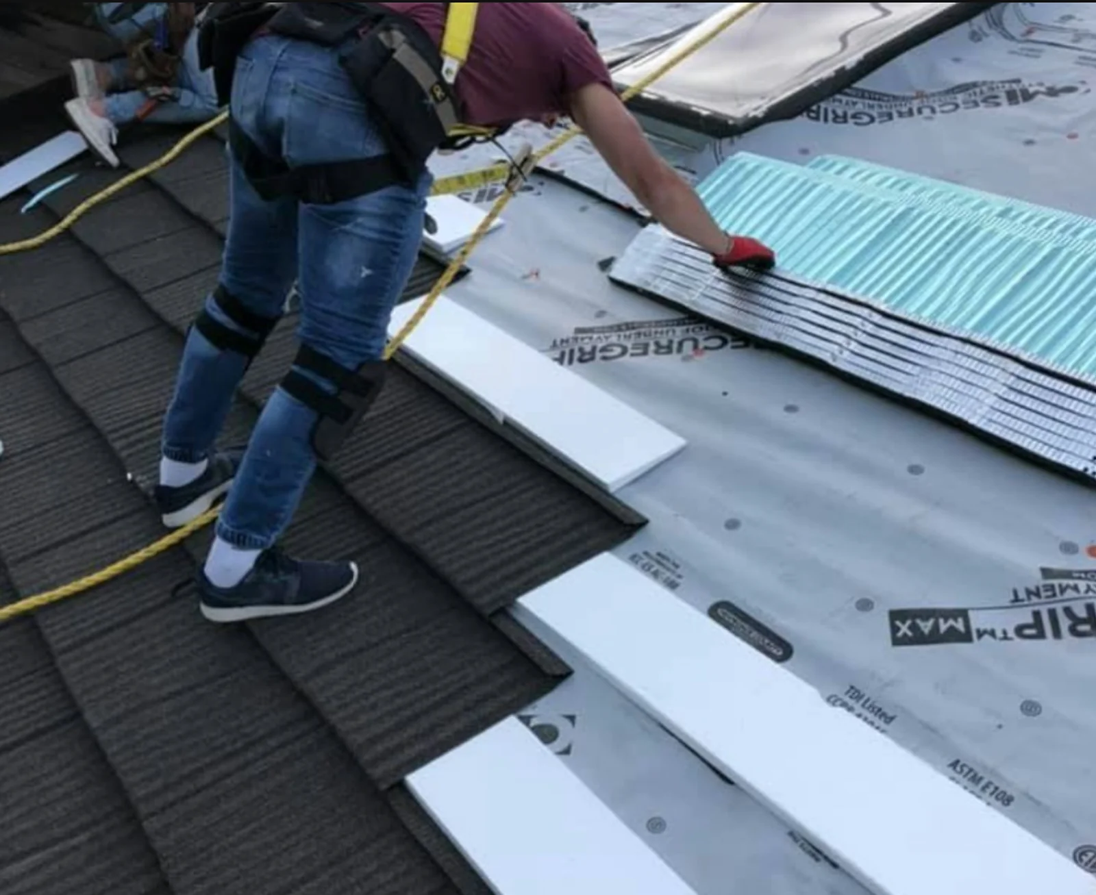 Roof installation with underlayment and shingles